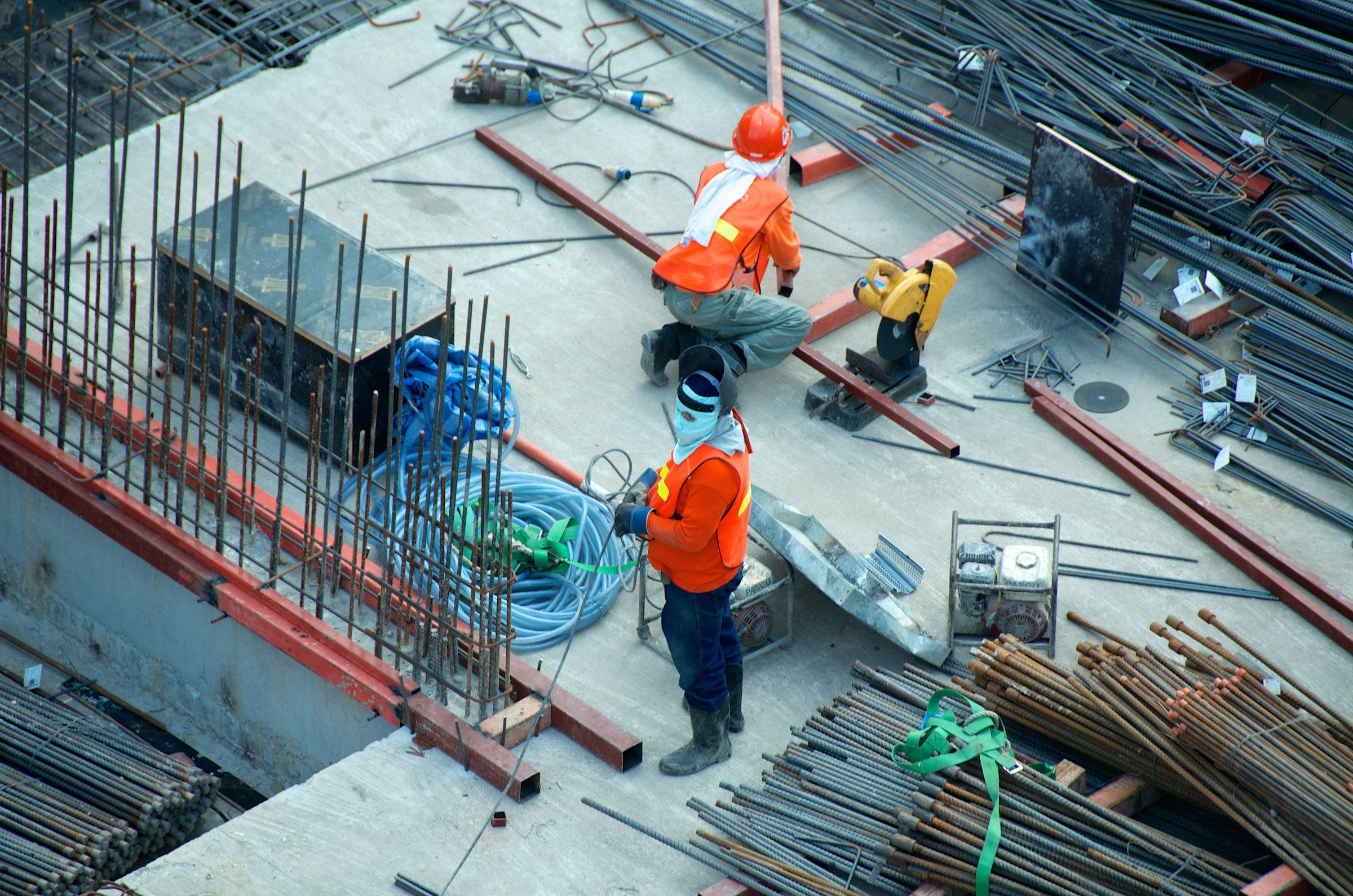 Construction workers at an overseas industrial site